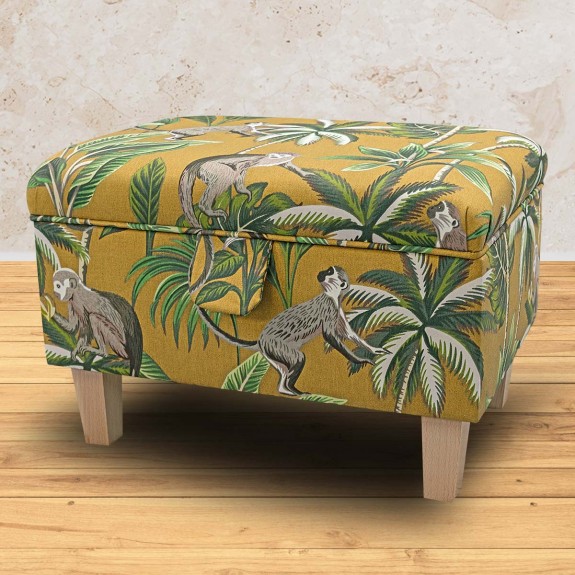 yellow ottoman in monkey fabric