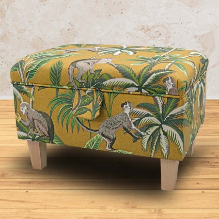 yellow ottoman in monkey fabric