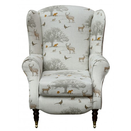 Duchess Wingback Armchair in a Tatton Autumn Print with front castor Legs