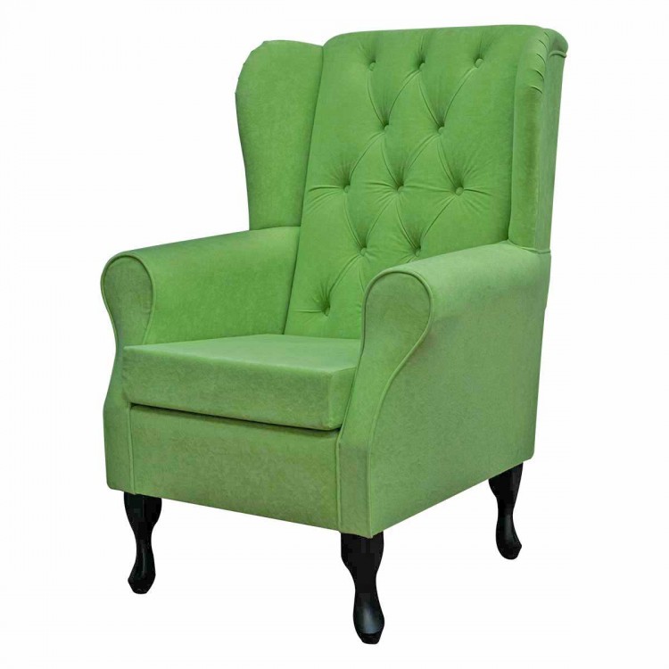 green wingback chair with buttoning